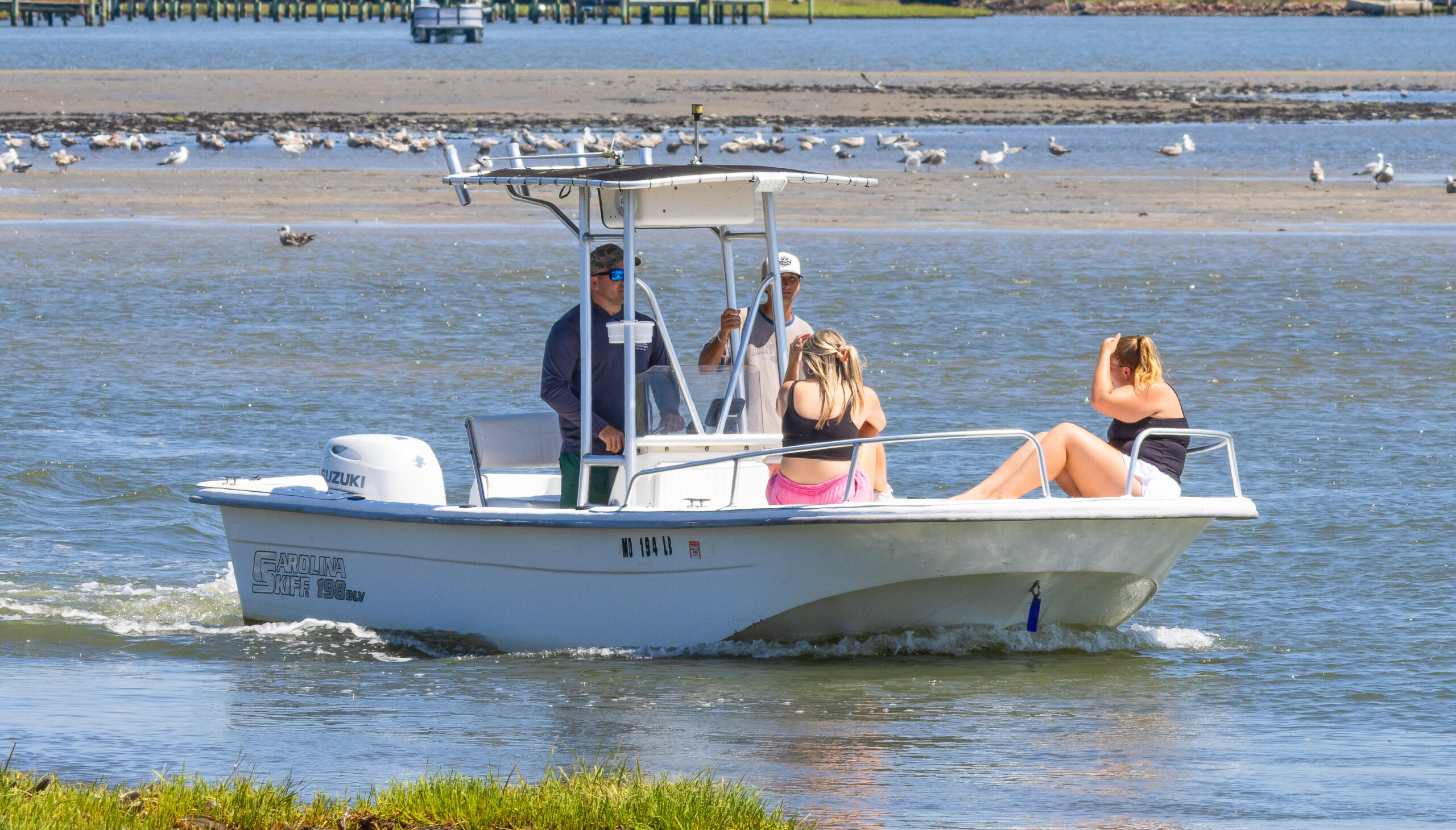 4 people on a boat rental in ocean city md